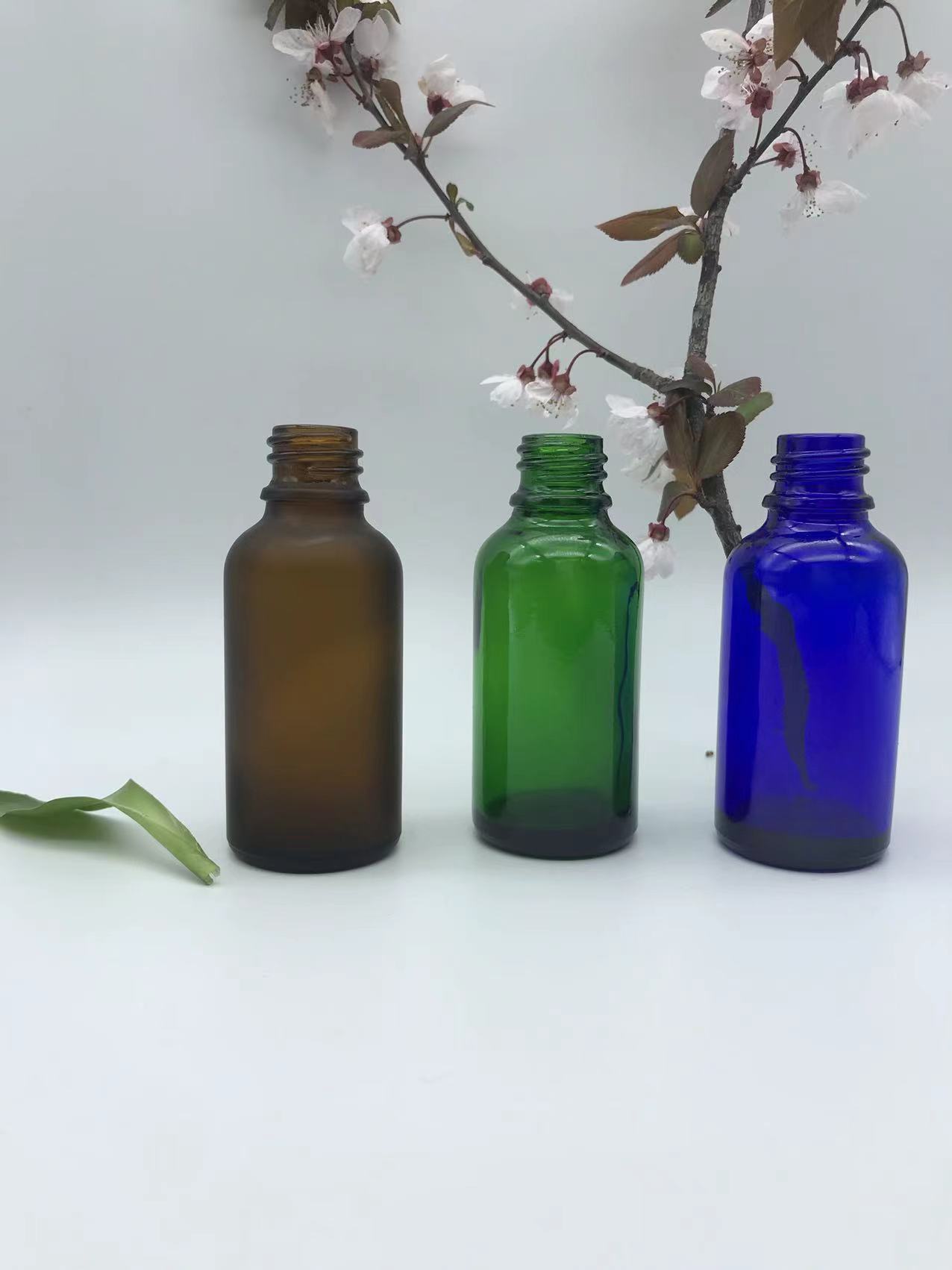 Botella de vidrio transparente